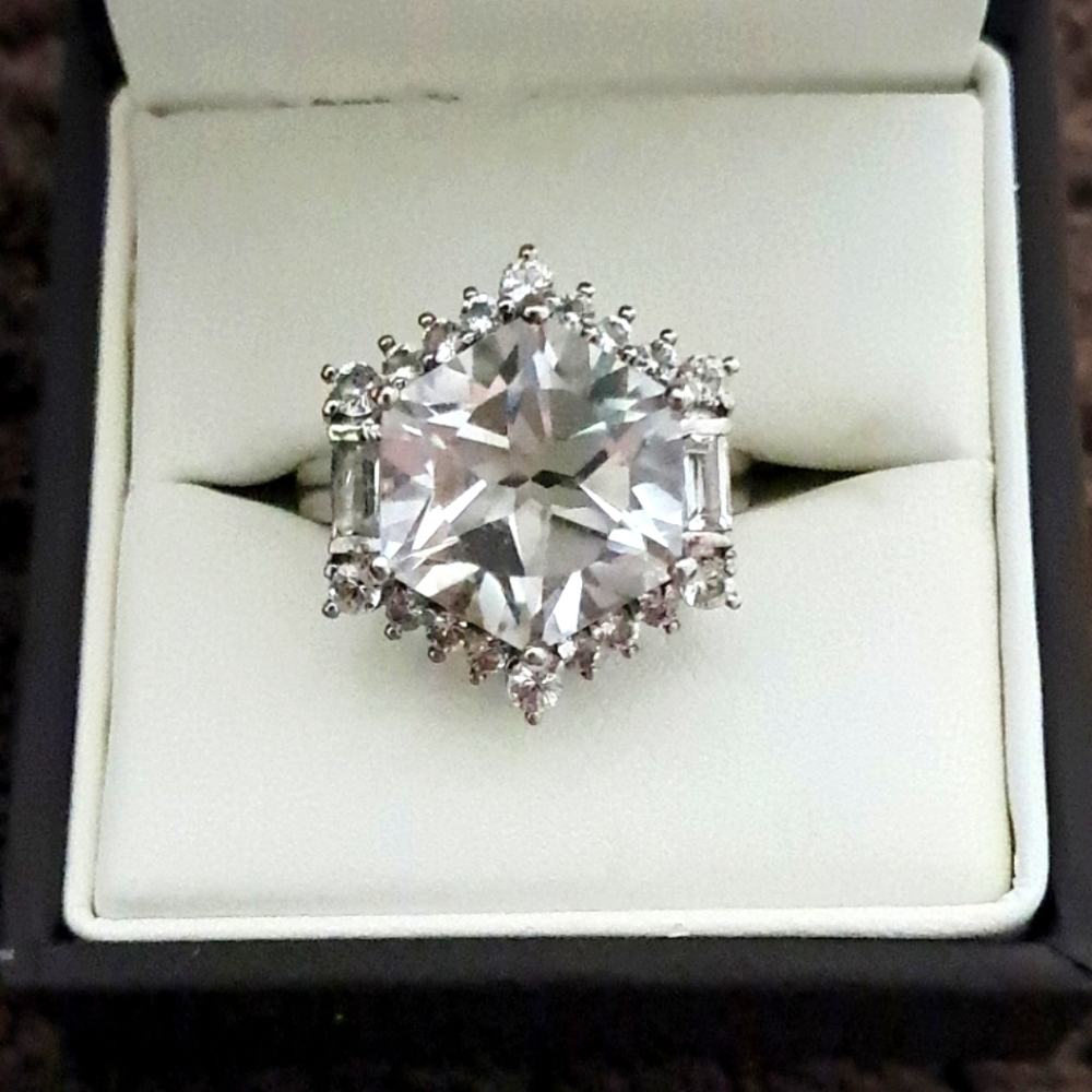 White Topaz Halo Ring In Platinum Over 925 Sterling Silver.